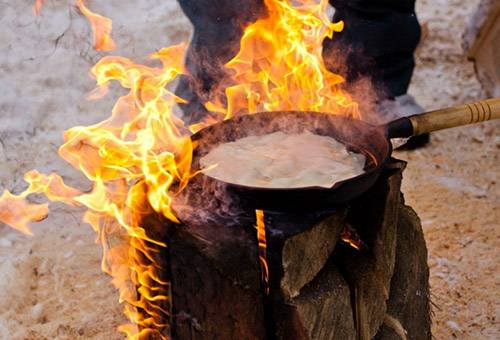 Frying pan over an open fire