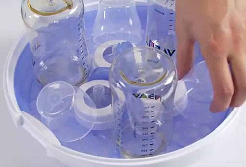 Electric steam sterilizer for baby bottles