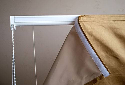 Linen Roman curtain on a plastic cornice