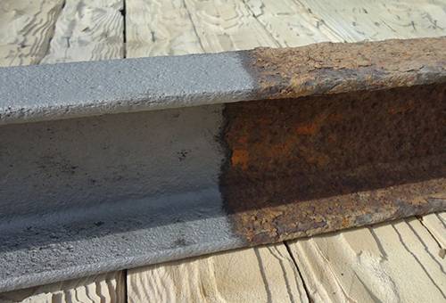 Rust removal of a metal beam