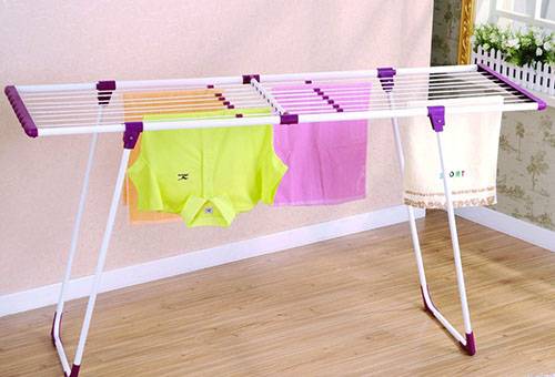 Drying clothes on the floor dryer