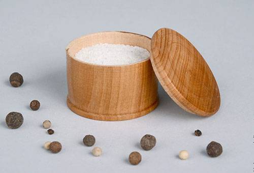 Salt in a wooden salt shaker