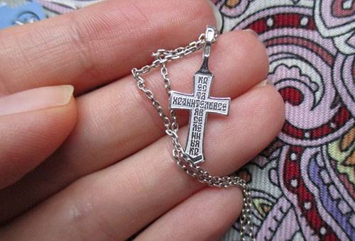 Silver cross on a chain