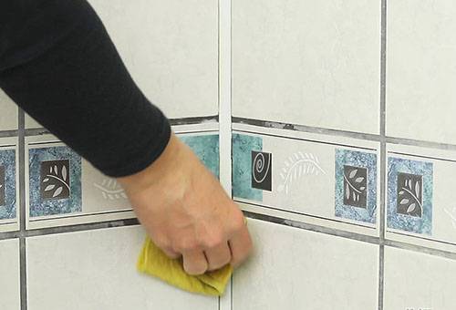 Washing the tiles in the shower