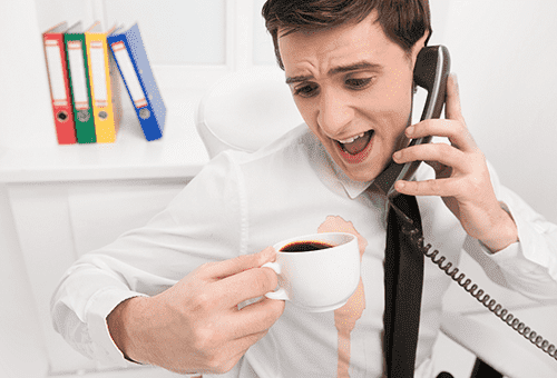 A man poured coffee on a shirt