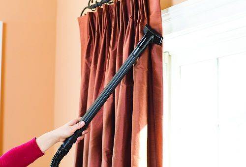 dry curtain cleaning with a vacuum cleaner