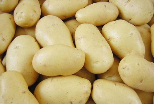 Peeled young potatoes