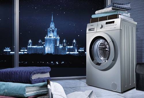 Máquina de lavar à noite