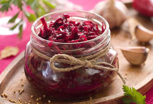 Grated beets in a jar