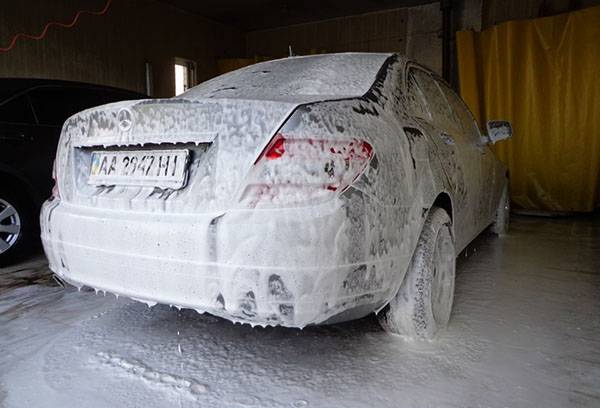 Car in washing foam