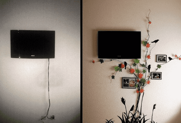 cables de TV ocultos debajo de las flores