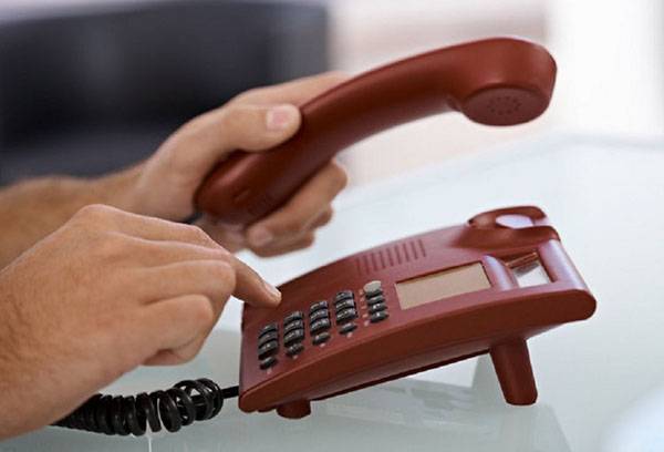 Dialing a number on the telephone