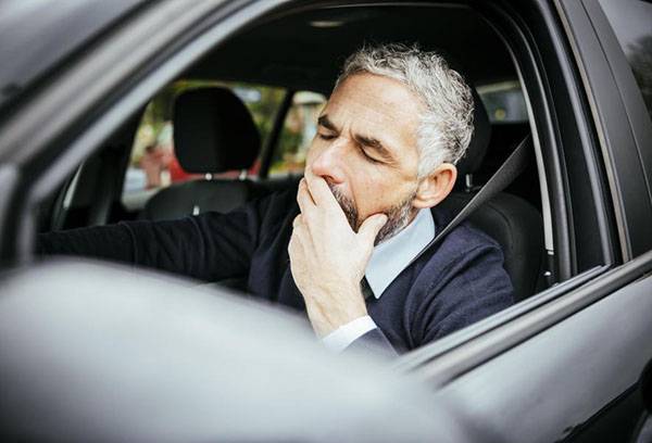 Man falls asleep at the wheel