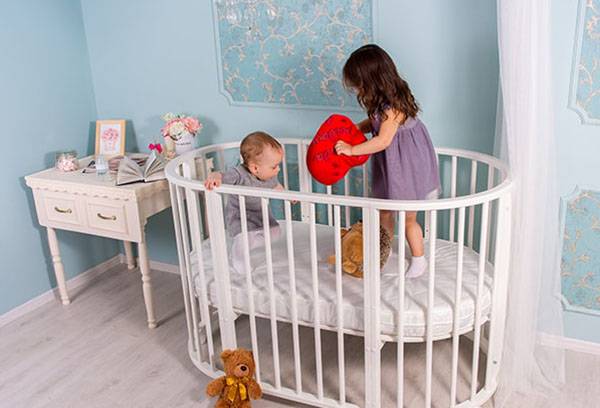 Children jump in the crib