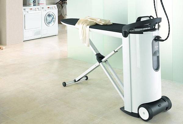 Ironing board with steam generator