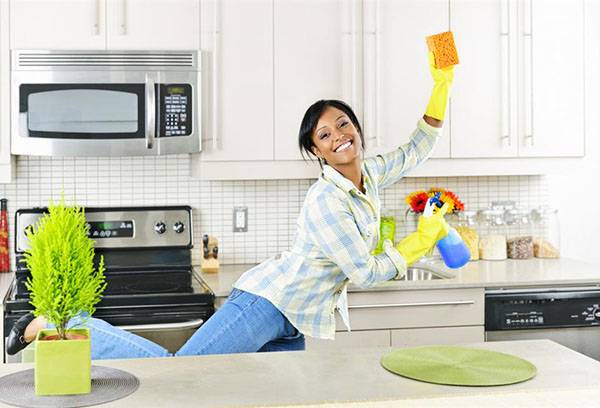 Positive girl cleaning