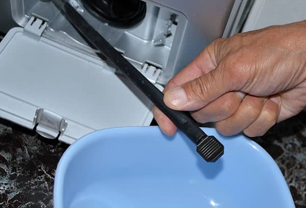 Vidange d'urgence de l'eau de la machine à laver