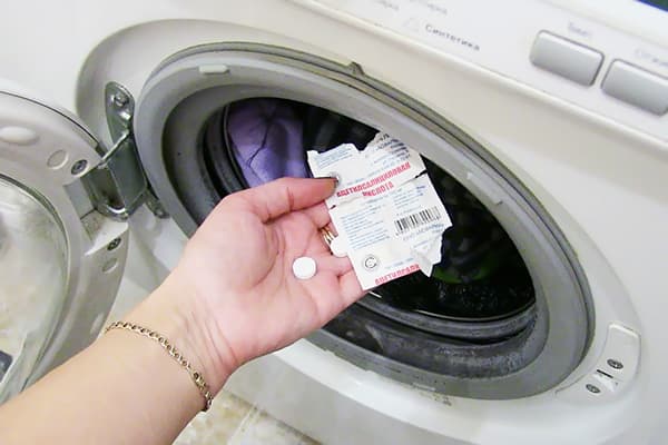 Tilsætning af aspirin, når du vasker i en vaskemaskine
