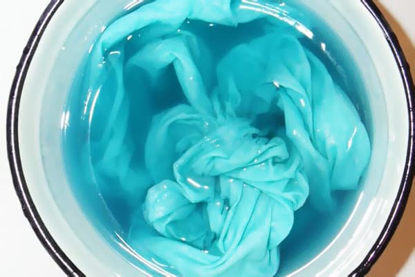 Fabric dyeing with aniline dye