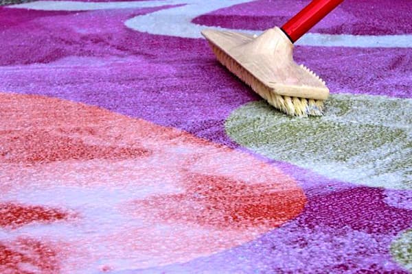 Cleaning a bright multi-colored carpet