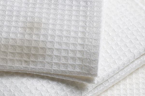 Stains on a white waffle towel