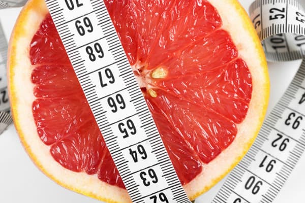 Grapefruit and tape measure