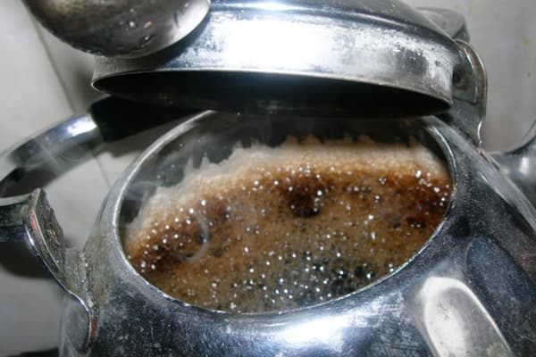 Coca-Cola boils in a teapot