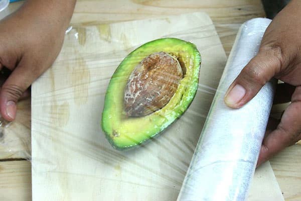 Preparing avocado halves for storage
