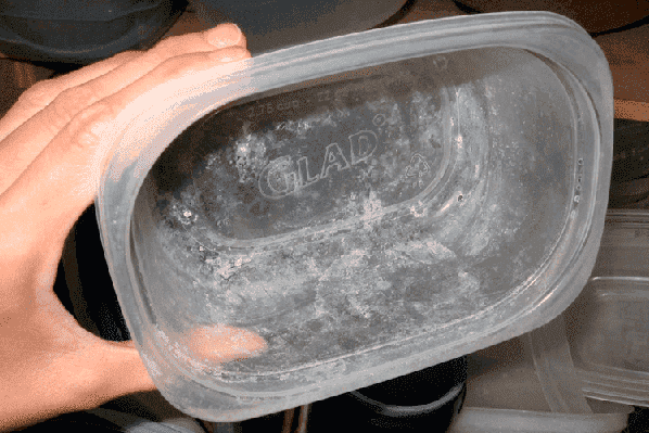 Plastic container after washing in a dishwasher
