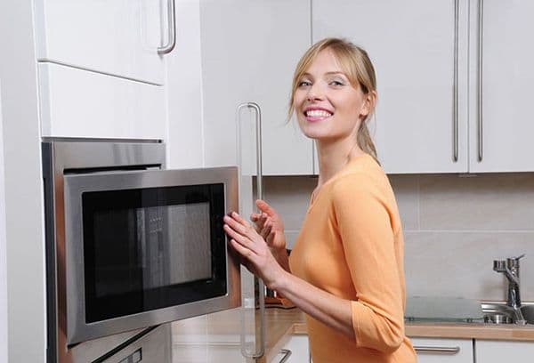 Girl at the microwave