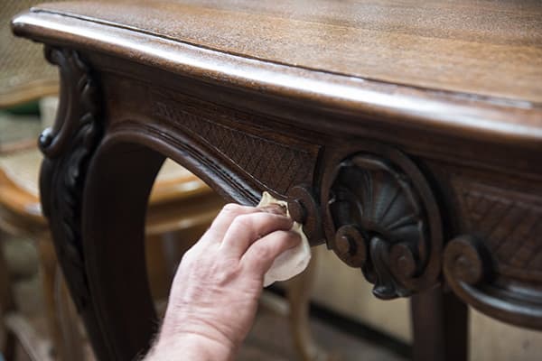 Restoration of wooden furniture with wax