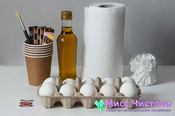 Everything you need for painting eggs with napkins and food coloring
