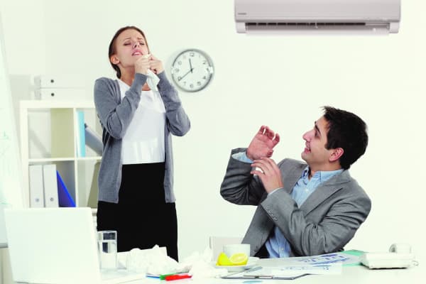 Female runny nose in office