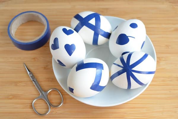 Painting eggs using electrical tape