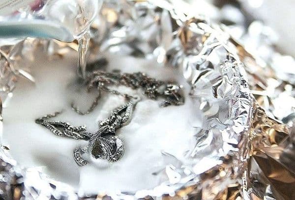 Cleaning silver in foil