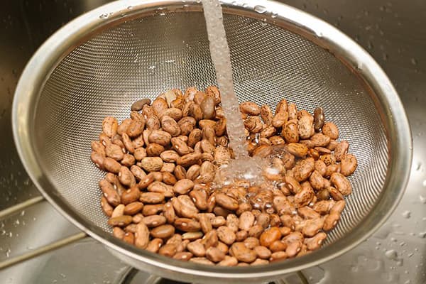 Rinse beans under running water