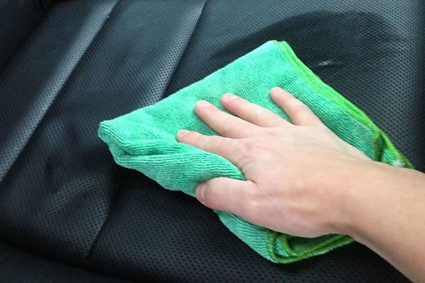 Cleaning the eco-leather car seat