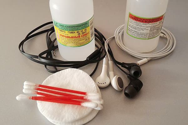 Headphones, cotton pads and hydrogen peroxide