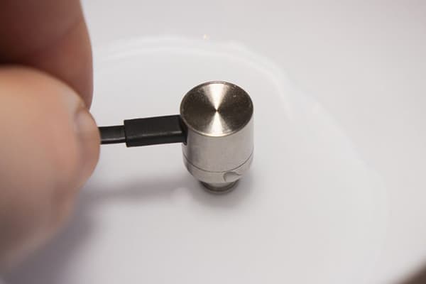 Immersion of a vacuum earpiece in peroxide