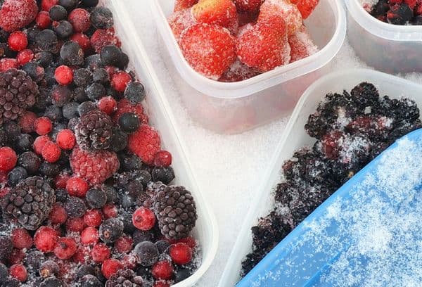 berries in containers in the freezer