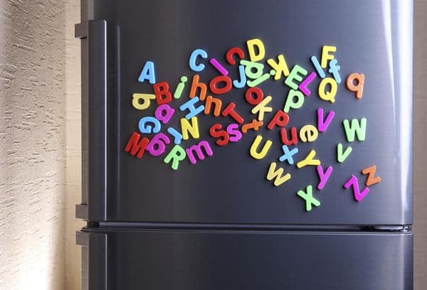 Magnets are hanging on the refrigerator