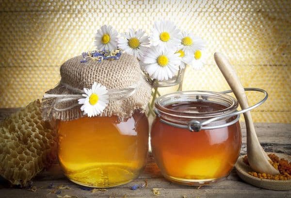 Honing in een glazen container