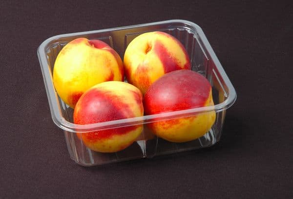 ябълки в контейнер за еднократна употреба