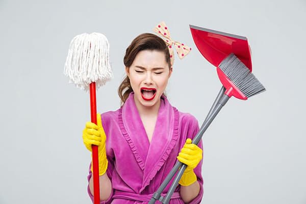 Girl with cleaning equipment