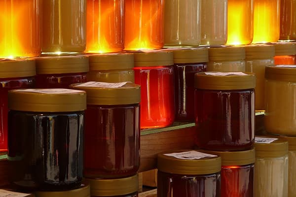 Jars of honey of different varieties