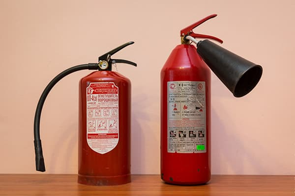 Powder and carbon dioxide fire extinguishers