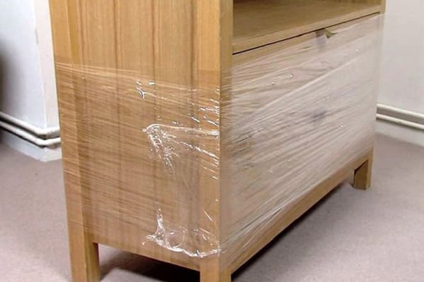 Dresser wrapped in cling film