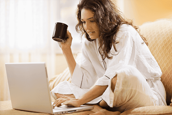 Girl at home at a laptop