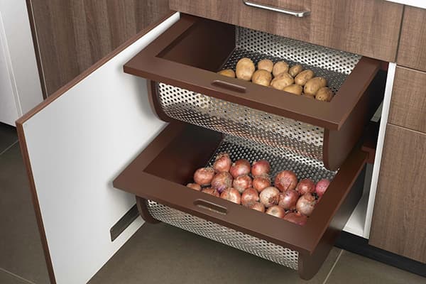 Drawers for vegetables in the kitchen cabinet